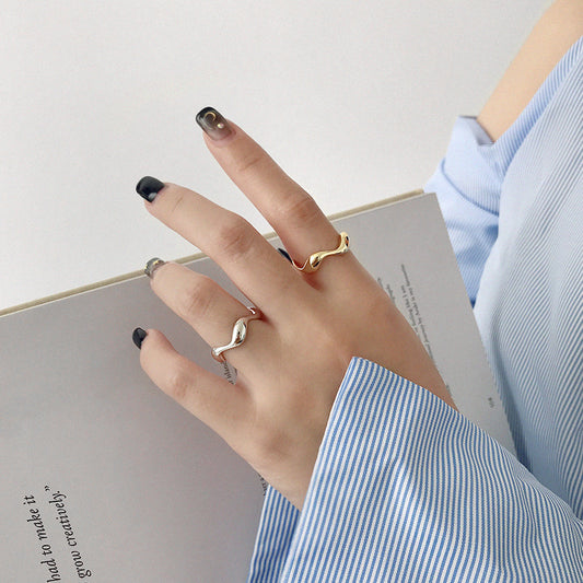 Irregular wavy smooth open ring