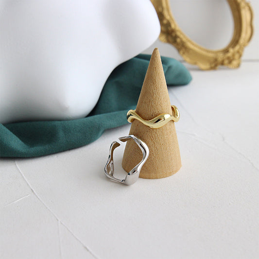 Irregular wavy smooth open ring